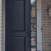 black fiberglass door with direct set sidelite