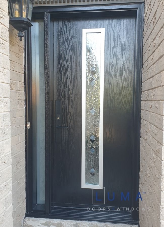 Black fiberglass entry door with off set glass insert and frosted sidelite