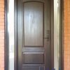 brown fiberglass door with camber panel and sidelites