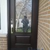 brown fiberglass door with glass