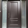 Dark brown steel front door with two sidelites.