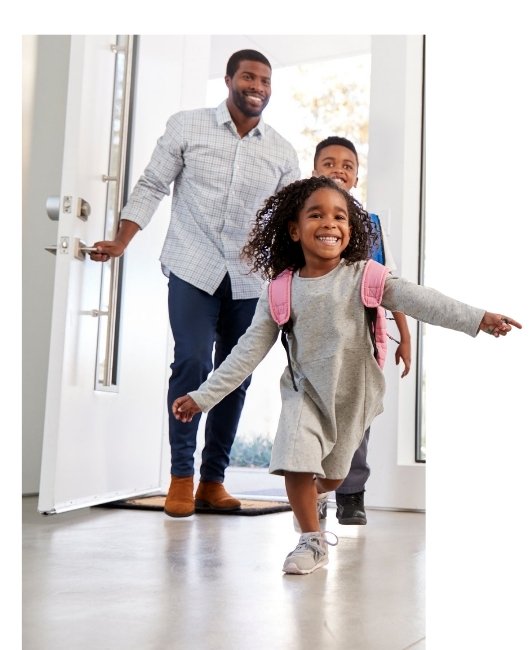 Family with their white fiberglass door.