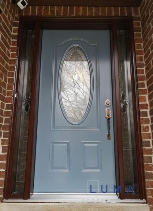 light blue steel door with round glass insert