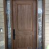 light brown fiberglass door with sidelites and transom