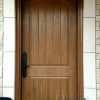 light brown single fiberglass door