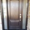 modern brown fiberglass door with two sidelites