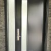 modern brown steel door with sidelite