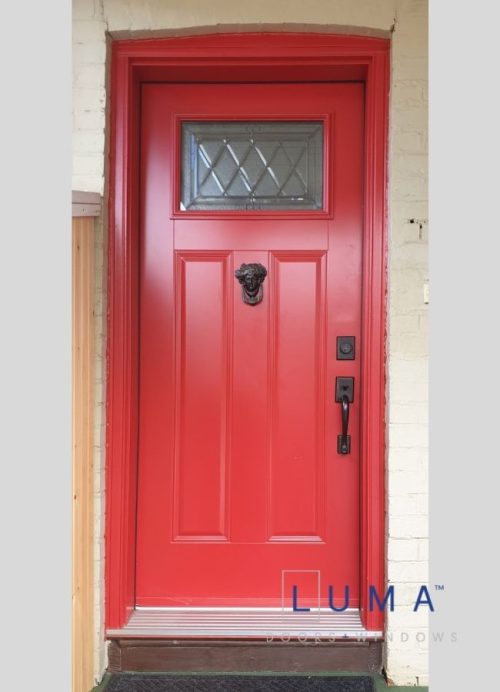 red steel entry door with decorative glass insert