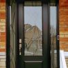Trendy steel entry door with iron design glass