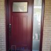 Steel Door System, Novatech Victoria door slab with privacy glass, painted burgundy colour exterior, black lock
