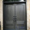 Fiberglass Double Door with arched clear glass transom, multi point locking system, charcoal stain in and out
