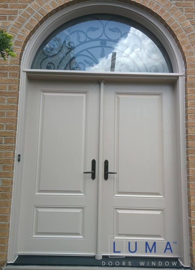 Fiberglass double door, 2 panel solid slabs, arch wrought iron glass transom, multi point locking system, painted cashmere outside
