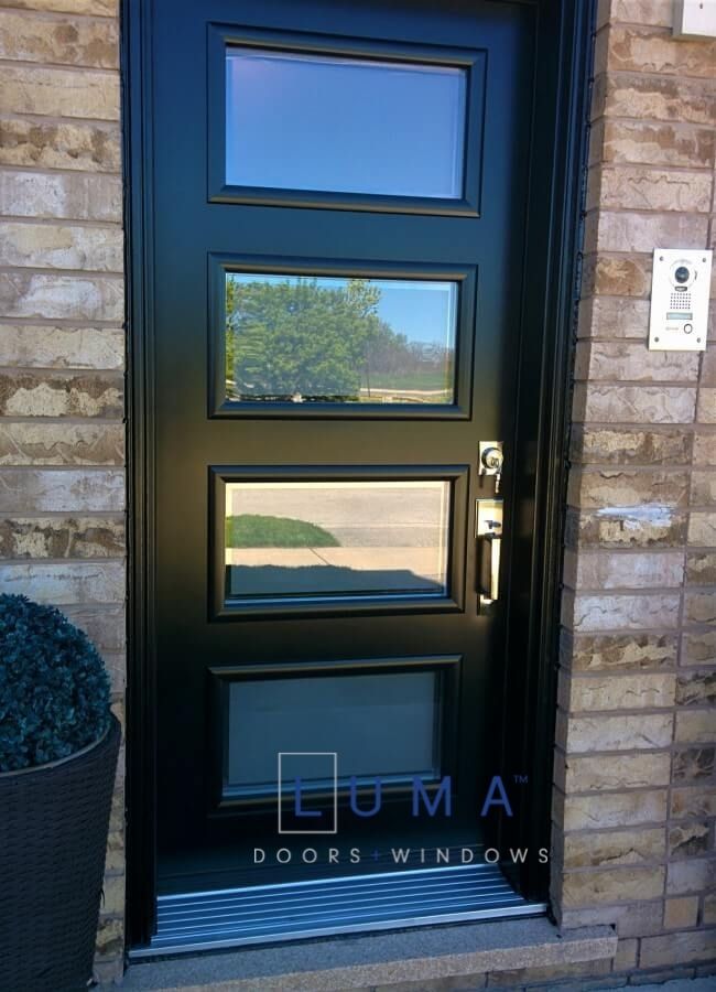 Modern Single steel door, 4 lite door design, clear border with sandblast center glass, painted black exterior, modern silver lock
