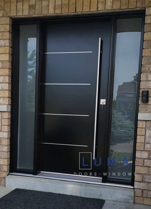 Modern Steel Door System. Single door with 2 direct glass sidelites, uno offset 4 aluminum line design slab, long round pull bar system, privacy glass sidelites, silver threshold, painted black exterior