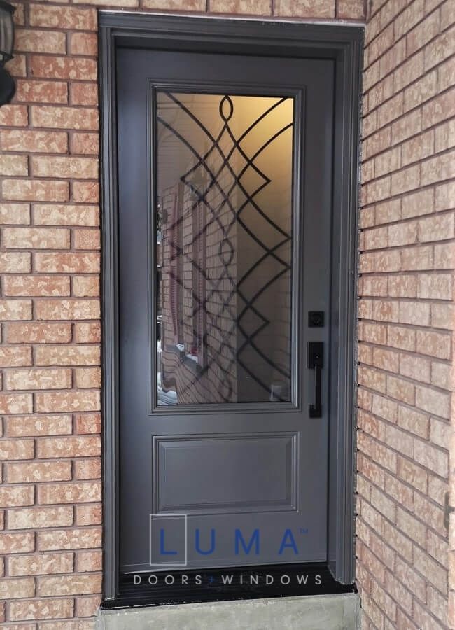Single Steel Door, painted slate grey exterior, 2 panel door slab with 22x48 oakridge wrought iron glass design, black modern lock set
