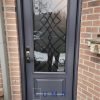 Steel Door, single door, 2 panel door slab with 2248 oakridge wrought iron glass design, painted slate gray exterior, silver sill, multi point lock system