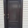 Steel single door, solid 2 panel door slab, peep hole, pewter colour door lock, black threshold, painted kaycan commercial brown exterior