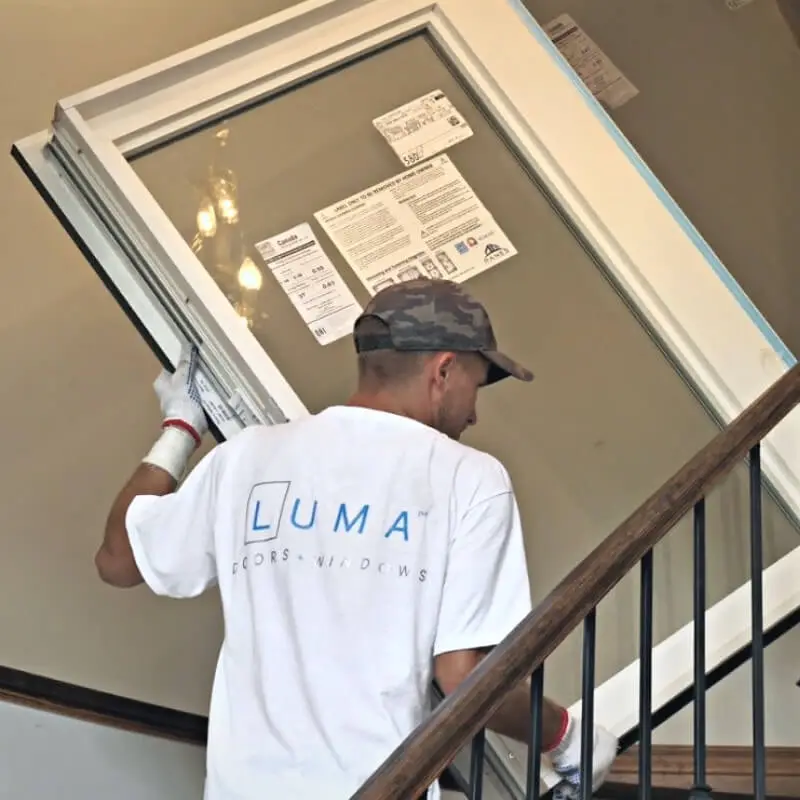 luma team member with window
