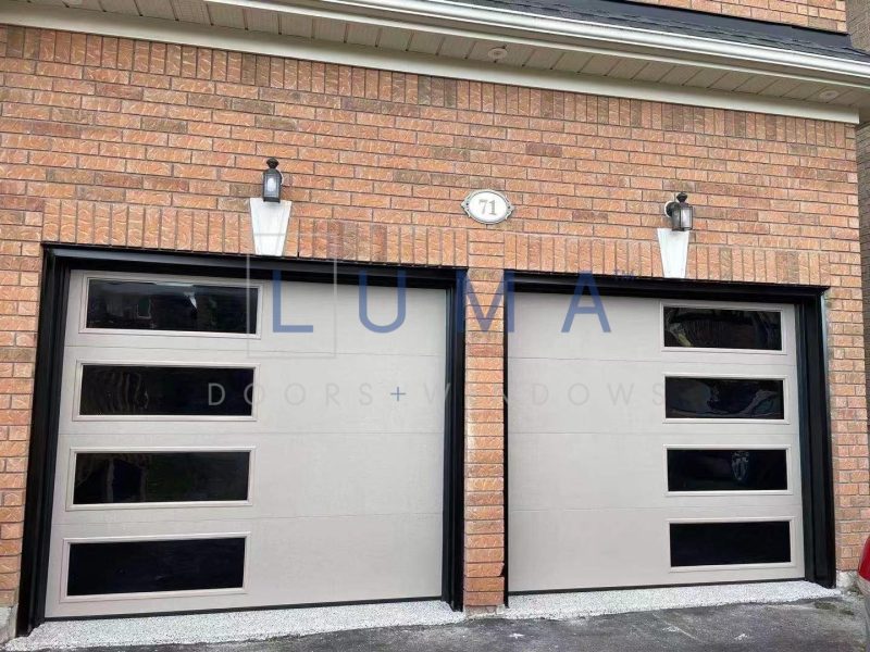Luma beige garage doors with dark tinted windows inserts