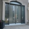 Beige steel door with direct glass sidelites
