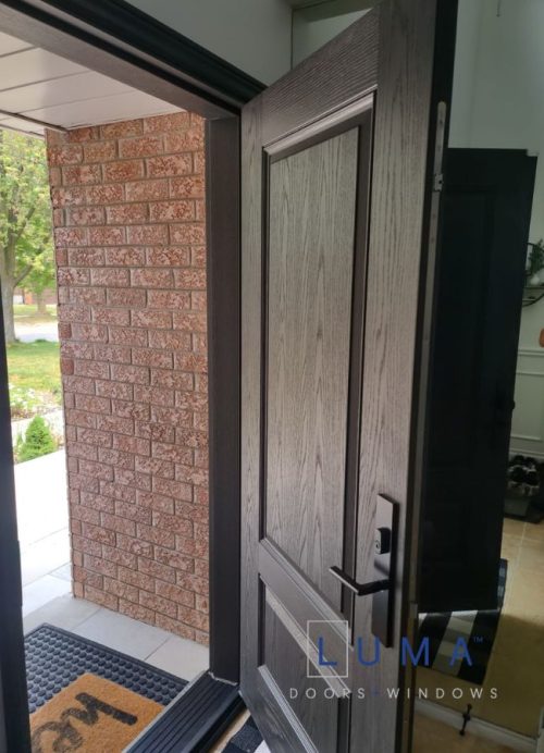 Beige steel door with direct glass sidelites
