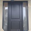 single black door with twin sidelites