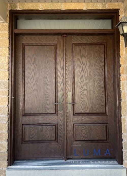 Brown fiberglass double door with top transom