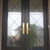 black door with detailed glass inserts