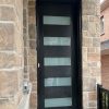 Black fiberglass door with multiple glass inserts