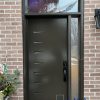 Green steel entry door with transom