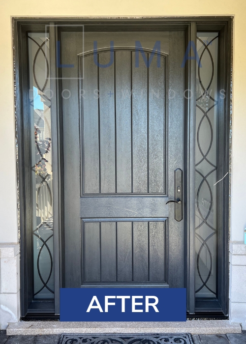 Black fiberglass door with iron sidelites