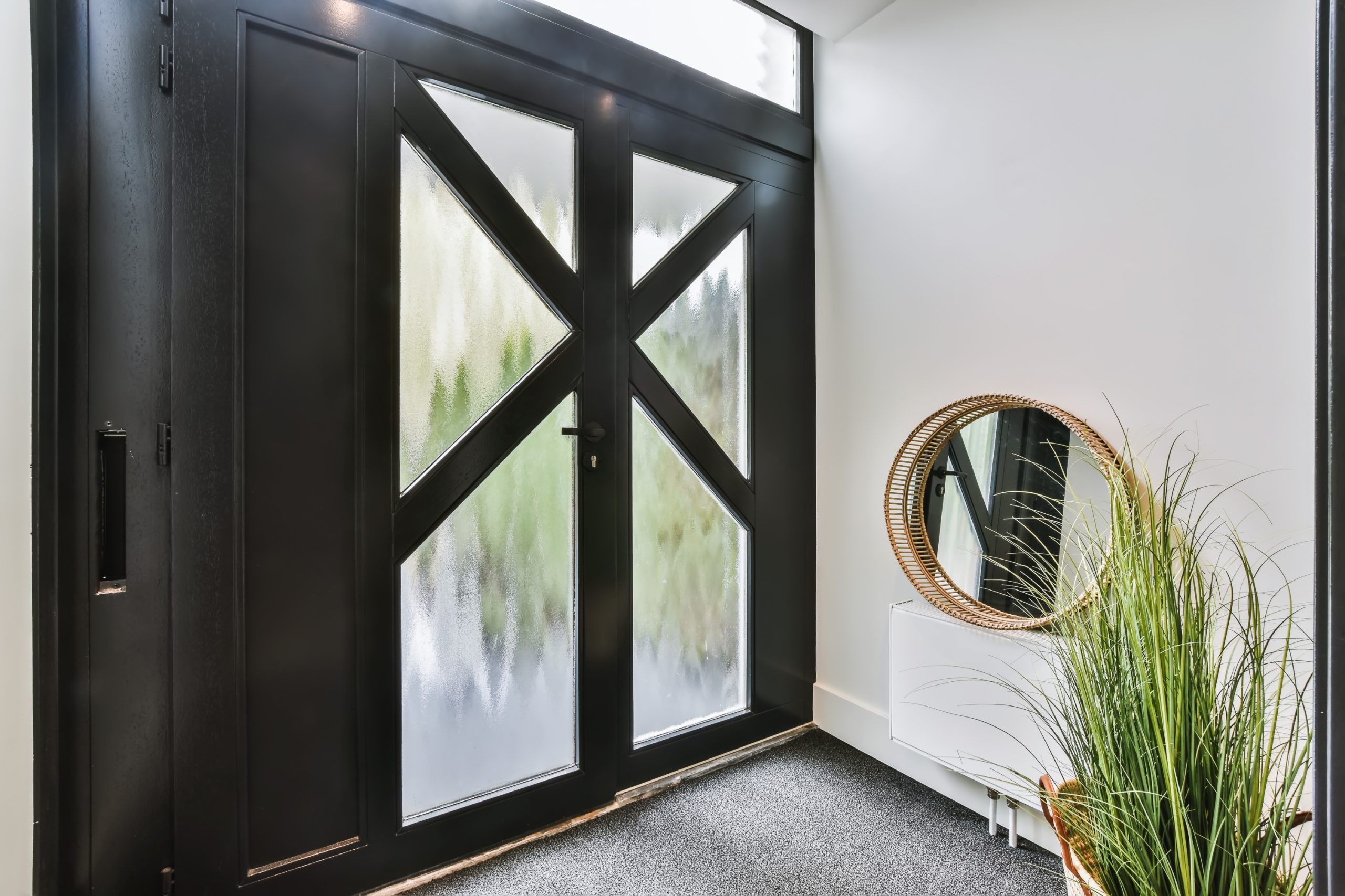 black double front door with glass inserts